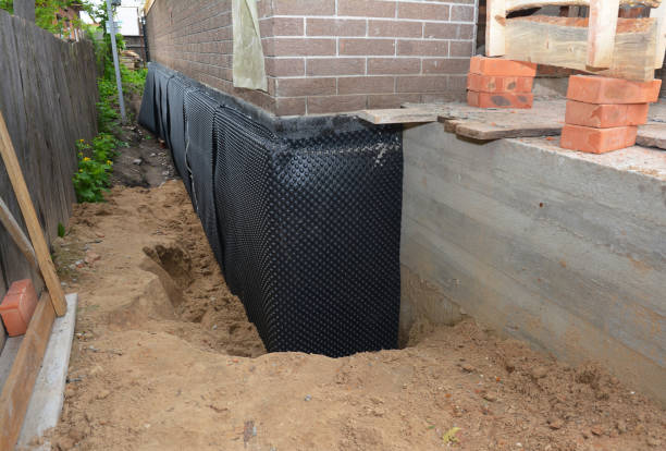 Happy homeowners after waterproofing job in Haymarket